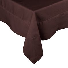 a brown table cloth on top of a white table