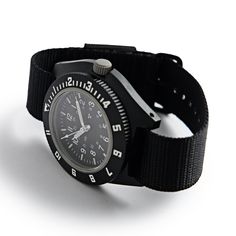 In 1986, Kelly Air Force Base needed watches that could withstand extreme changes in pressure, be used at high altitudes, and remain legible and accurate in the process. This watch was created to meet those demands. Handmade in Switzerland and designed for pilots and parachute missions, this watch has been issued and worn by troops in Iraq and Afghanistan. A detachable compass with a glow-in-the-dark bezel furthers the military feel. The watch features a lightweight, specialized fiber shell case Air Force Base, Air Force Bases, Nato Strap, High Altitude, The Military, James Bond, Iraq, Pilots, Quartz Movement