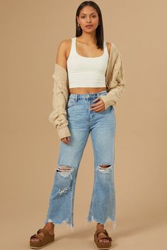 Effortlessly cool and endlessly versatile, these high-rise straight-leg jeans exude casual chic with their distressed knees, adding a hint of edge to your ensemble. Embrace laid-back sophistication and style these jeans effortlessly for any occasion, whether it's a casual day out or a night on the town. Trendy Fall Flare Jeans With Frayed Hem, Trendy Distressed Cropped Jeans For Everyday, Trendy Ripped Cropped Jeans For Everyday, Distressed Cropped Jeans For Fall, Trendy Straight Leg Fall Jeans, Chic Ripped Straight Leg Jeans, Everyday Ripped Cropped Jeans For Fall, Fall Everyday Ripped Cropped Jeans, Trendy Everyday Cropped Jeans