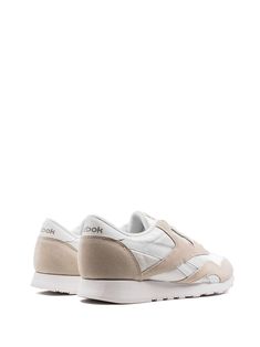 Find REEBOK Classic Nylon Sneakers on Editorialist. white/light grey suede/rubber logo print to the rear contrasting panel detail round toe front lace-up fastening logo patch at the tongue branded insole rubber sole These styles are supplied by a premium sneaker marketplace. Stocking only the most sought-after footwear, they source and curate some of the most hard to find sneakers from around the world. Classic White Sneakers With Elastic Laces, White Nylon Sporty Sneakers, White Sneakers With Elastic Laces For Streetwear, White Low-top Nylon Sneakers, White Nylon Sneakers With Elastic Laces, Nylon Sneakers With Contrast Sole For Light Sports, White Nylon High-top Sneakers, White Nylon Sneakers With Cushioned Footbed, White Nylon Sneakers With Round Toe