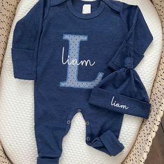 ✿ Welcome to our shop ✿ Our goal is to bring you the cutest and trendiest designs on the highest quality sweatshirts and shirts. All of our products are designed, embroidered printed, pressed, and shipped from our NJ studio. This adorable sleeper makes a perfect coming home outfit, newborn pictures, or baby shower gift. This features an ultra soft romper, with stitched name. Matching hat that will come with matching stitching. This outfit makes a perfect coming home outfit, newborn pictures, or Blue Cotton Set For Birthday, Embroidered Cotton Sets For Loungewear, Fitted Cotton Sets For Gifts, Cute Letter Print Sets With Crew Neck, Family Matching Cotton Sets With Letter Print, Cotton Onesie With Name Print, Casual Cotton Onesie With Crew Neck, Unisex Long Sleeve Cotton Sets, Casual Long Sleeve Onesie With Letter Print