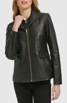 Elevate your cool-weather looks with this lambskin-leather jacket cut in a streamlined silhouette and topped with a contemporary stand collar. 25 1/2" length (size Medium) Front zip closure Stand collar Front on-seam pockets with decorative flap Lined Leather Professional leather clean Imported Sleek Leather Jacket With Zipper Closure, Modern Leather Outerwear With Asymmetrical Zip, Modern Leather Jacket With Zip Fly For Fall, Modern Leather Jacket With Zipper For Fall, Sleek Leather Outerwear With Asymmetrical Zip, Sleek Leather Jacket With Zip Fly For Winter, Collar Leather Jacket, Black Moto Jacket, Wing Collar