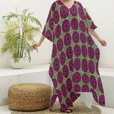 Stay cool and stylish with our Adinkra Print Women's Imitation Silk V-neck Kaftan Robe. Capture your memories in comfort and style with this must-have travel essential. Fabric: Imitation Silk(97% polyester and 3% spandex) Regular fit V-neck Fabric weight: 90g/m² Care Instruction: machine wash cold with similar colors, do not bleach, tumble dry low, do not iron, do not dry clean. Traditional Multicolor V-neck Kimono, Green Printed V-neck Kaftan, Green V-neck Printed Kaftan, Printed V-neck Tunic, Green Printed V-neck Kimono, Bohemian Patterned V-neck Kaftan, Traditional V-neck Kimono For Vacation, Green V-neck Free Size Kaftan, Green V-neck Free-size Kaftan