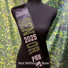 Make the event memorable with a custom senior music, band, chorus, majorette, drill team sash! Created with top quality satin ribbon. Size: One size fits most. Total sash length is 36" Ribbon Width: 4" (shown in sample photo)  Sash will NOT be sewn and a safety pin will be included to allow for a custom fit. Customize Your  Sash! Please be very detailed in the comment section to avoid delay of processing. -Choose SENIOR layout from photo - clearly note # -Choose ACTIVITY IMAGE from photo  - clearly note # Choose up to 2 colors and note color placement. Note personalized details: Name for sash, year, school abbreviation etc Type school / names EXACTLY how you wish them to appear. INFORMATION TO ASSIST YOU IN YOUR SASH PURCHASE. *Each sash is individually packaged with a safety pin for gift Senior Sash Ideas, Senior Night Sash, Sash Ideas, School Names, Senior Cheerleader, Senior Sash, Drill Team, Wedding Sash Belt, Senior Night