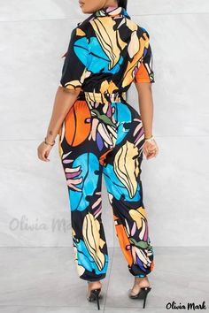 Olivia Mark - Stylish Patchwork Turndown Collar Regular Jumpsuits in Classic Black Casual Black Printed Jumpsuit, Casual Black Printed Jumpsuit/romper, Casual Multicolor Short Sleeve Jumpsuits And Rompers, Casual Multicolor Jumpsuits And Rompers For Work, Patchwork Jumpsuit, Party Pants, Swimwear Bottoms, Lace Dress Long, Long Sleeve Short Dress