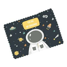 an astronaut themed placemat with the words you're my spaceman on it