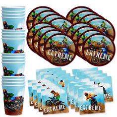 a bunch of cups and plates with pictures on them