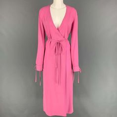 Attico Dress Comes In A Pink Acetate / Viscose Featuring A Wrap Style, Sleeve Strap Details, Slit Pockets, Side Slits, And A Back Self Tie Strap Closure. Made In Italy. New With Tags. Marked: 36 Measurements: Shoulder: 15 Inches Bust: 36 Inches Waist: 30 Inches Hip: 36 Inches Sleeve: 27 Inches Length: 52 Inches Sui Generis Reference: 118193 Category: Dress More Details Brand: Attico Gender: Female Size: 0 Color: Pink Fabric: Acetate / Viscose Pattern: Solid Style: Wrap Age Group: Adult Sui Generis Designer Consignment Is An Award Winning Fashion Resale Store For Women & Men. Located In San Francisco. The New York Times, Gq, Refinery29, Goop, Forbes And Attico Dress, Resale Store, Pink Fabric, The New York Times, Wrap Style, New York Times, Gq, Wrap Dress, Womens Dresses