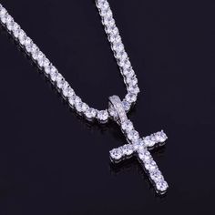 IceBox DC: ✨ Elevate Your Wrist Game in 2024 ✨ Men's 3mm Tennis Chain Cross Pendant Necklace (Shop Now!) Shine brighter than ever with this icy take on a hip-hop classic in 2024. IceBox DC's Men's 3mm Tennis Chain Cross Pendant Necklace is the ultimate way to level up your wrist game and showcase your faith in style in 2024. This meticulously crafted necklace features a gleaming gold-plated finish and a dazzling micro-pave AAAA cubic zirconia cross pendant. A Timeless Symbol for 2024 and Beyond The Perfect Hip-Hop Accessory: Embrace your love for the genre with this iconic iced-out cross pendant, a must-have for any trendsetter in 2024. Sparkling Brilliance: The micro-pave AAAA cubic zirconia shimmers with brilliance, catching the light and turning heads wherever you go in 2024. Enduring S Diamond Chain For Men Sterling, Nike Chain Necklace, Tennis Chain Necklace, Necklace Chain Types, Rhinestone Material, Tennis Chain, Choker Pendant, Gold Cross Pendant, Diamond Cross Pendants