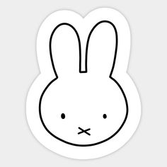 a white sticker with a black outline of a rabbit's face