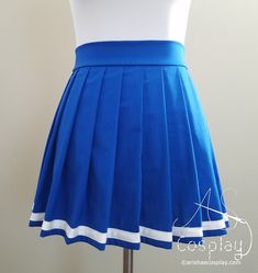 Knife Pleat Skirt with Stripe- This pleated skirt is made in a popular style for anime-style school uniform skirts. It is available in any size and color with one or two stripes. The skirt is made from high quality 100% cotton fabric and closes in the back with an invisible zipper. Add a Matching Face Mask to Your Order! The masks ship in 1-2 days and you can preview the fabric in your color preference. https://www.etsy.com/listing/788750961/washable-face-mask-layered-pleat-face The skirts are s School Fitted Tiered Skirt, Blue Cotton Pleated Skirt For School, Knife Pleated Skirt Outfit, Fitted Tiered Skirt For School, Cosplay Mini Pleated Skirt, School Cotton Pleated Flared Skirt, Flared Cotton Pleated School Skirt, Fitted Blue Skirt For Cosplay, Blue Fitted Skirt For Cosplay