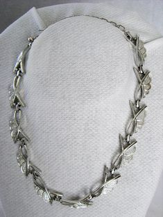 "This 1950's-60's SARAH COVENTRY NECKLACE & BRACELET SET is in a simple/elegant textured silvertone design. The necklace measures approximately 18\" and the bracelet measures approximately 7\" ( see photos ). Signed SC on the back of each piece , the set is in GOOD VINTAGE CONDITION. Questions? Please call 1-207-865-6191." Retro Silver Metal Necklaces, Retro Silver Metal Necklace, Retro Silver Metal Jewelry, Silver Retro Jewelry For Formal Occasions, Retro Silver Jewelry For Anniversary, Silver Retro Jewelry For Anniversary, Mid-century Metal Jewelry For Formal Occasions, Mid-century Silver Necklace Gift, Retro Metal Jewelry For Anniversary