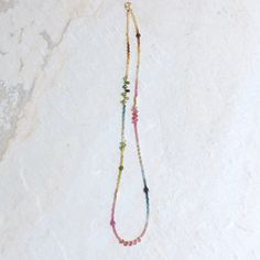 "While it may not be a common practice, I especially choose to rearrange each of the tiny beads when creating this necklace. This allows for a gentle gradation of colors, creating a smooth transition between different shades of tourmaline and resulting in a beautiful and harmonious necklace. By taking the extra time and effort to carefully arrange the beads, I can create a unique and personalized piece that showcases the full range of colors found in tourmaline. You will receive the same necklac Tourmaline Beaded Necklaces For Jewelry Making, Multicolor Tourmaline Beaded Necklace With Faceted Beads, Multicolor Tourmaline Faceted Beads Necklace, Tiny Beads, Tourmaline Stone, Watermelon Tourmaline, Layered Necklace, Gold Beads, Jewelry Organization