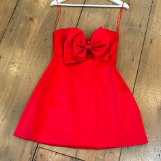 Amazing Fit With How Detail Elegant Fitted Dresses With Red Bow, Red Summer Gala Dress, Red Sleeveless Mini Dress For Gala, Elegant Mini Dress For Red Carpet, Elegant Red A-line Mini Dress, Red Evening Dress With Bow, Elegant Evening Dress With Red Bow, Red Evening Dress With Red Bow, Red Carpet Mini Dress For Summer