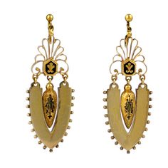 Rare Victorian earrings with mottled and shiny textures. High style urn form pendants with black enamel to match fleur de lis motifs above. Entire earring is articulated to move with wearer. Circa 1870s.
 Excellent condition,6cm x 2cm. Screw back fittings. 2.5" x .75". Asian Gold Jewelry, Gold Jewelry Antique, Victorian Drop Earrings, Byzantine Jewelry, Pearl Pendant Earrings, Victorian Jewellery, Contemporary Earrings, Jewelry Antique, Diamond Dangle Earrings