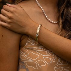 Adorned with tropical flowers, ferns, leaves and intricate scrollwork, our unique Hawaiian Heirloom designs are cherished Island keepsakes with tradition that traces back to Hawai‘i’s Queen Lili'uokalani. Hawaiian Heirloom Plumeria Design Hinge Bracelet with safety clasps 14k Yellow Gold, 14k Rose Gold and 14k White Gold Natural Diamond: 0.075 CTW 8mm Thickness Exclusively Made in Hawaiʻi Forever Guarantee (Warranty on the life of the piece) Free Shipping on USA Orders $100 or more Plumeria Design, Hinge Bracelet, Popular Bracelets, Hinged Bracelet, Tropical Flowers, Tri Color, Gold Frame, Natural Diamonds, Yellow Gold