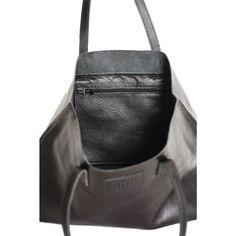 Leather Carry All Tote We don't call this the "Carry All" for nothing! This is the ultimate tote: large, durable against the elements, and the perfect balance of relaxed and structured. Your purchase helps to provide economic empowerment for women who are survivors of human trafficking and exploitation. Each piece is handcrafted by the woman it helps to employ. Through wearing Ethic Goods, you become a meaningful part of her story, and give freedom to women around the world. Black Leather Rectangular Weekender Bag, Minimalist Black Textured Leather Bag, Black Textured Leather Minimalist Bag, Everyday Smooth Grain Tote Weekender Bag, Minimalist Black Shoulder Bag With Smooth Grain, Classic Black Weekender Bag For Everyday Use, Modern Black Weekender Bag For Shopping, Black Everyday Shoulder Weekender Bag, Black Shoulder Weekender Bag For Everyday