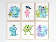 four children's wall art prints featuring monsters in pastel blue, green and pink