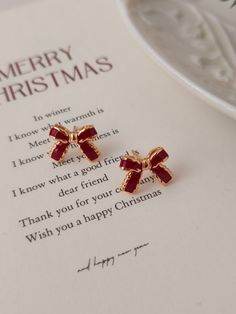 🫧 Christmas Bow Earrings 🫧 Earrings are made from Pure S925 18K Gold Plated  🤍  P E R F E C T  G I F T  F O R  H E R  🤍 * Christmas bow Earrings  * Meticulous attention to detail * hypoallergenic, nickel free & safe for sensitive skin * Perfect for bridal earrings, bridesmaid earrings or for everyday wear. 🤍 P R O D U C T - D E T A I L S 🤍 * Material: Pure 925 Silver,  * Plated: 18K Gold 🤍 W H A T ' S  I N  T H E  B O X 🤍 * Our Jewelry  * Silver Polishing Cloth * Alcohol Pads * Greeting Cheap Gold Christmas Earrings, Christmas Jewelry 2024, Christmas Earrings Aesthetic, Elegant Round Christmas Earrings, Round Earrings For Christmas Anniversary, Red Christmas Earrings For Formal Occasions, Red Earrings For Christmas Formal Occasion, Red Earrings For Christmas Formal Events, Elegant Valentine's Day Earrings For Festive Occasions