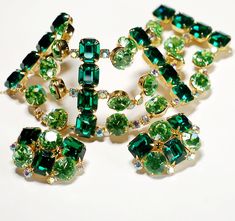 "Huge Emerald Rhinestone Bracelet Earring Set High End This Bracelet Earring Set was recently used in a Photo Shoot, See 2nd Picture Necklace Not for Sale. Here it is Ladies The Most Gorgeous, Shiny Gold tone set with Glorious Emerald Rhinestones, Peridot and Icy AB Rhinestones. Definitely a Designer Set, attributed to Schreiner. Bracelet 7\" x 2\" with chain guard and secure clasp. Matching 1 1/2\" x 1\" Earrings Gorgeous Pristine Condition! Unsigned You'll be the Envy of your Friends with this One!" Picture Necklace, Walmart Jewelry, Jewelry Advice, Butterfly Jewelry, Rhinestone Bracelet, Pricing Jewelry, Schmuck Design, Designer Earrings, Bronx