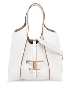 Timeless logo charm tote bag from TOD'S featuring calf leather, logo charm, press-stud fastening, two long top handles, main compartment and white. | Tod's Timeless logo charm tote bag Timeless Logo, Tods Bag, Heeled Rain Boots, High Heel Rain Boots, Lingerie Bag, Mini Tote Bag, Backpack Tote Bag, Mini Tote, Leather Logo