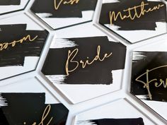 black and white hexagons with gold writing on them that say bride and groom