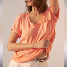 Anthropologie Beautiful Peachy Pink V-Neck Tee Perfect Basic In A Punchy Color Rolled Raw Hems Nice Loose Fit Size Xs Style Is Like The Picture See Photos For Measurements *Pt Casual Pink V-neck Top For Summer, Orange V-neck Top For Day Out, Relaxed Scoop Neck Summer Tops, Relaxed Fit V-neck Summer Top, Relaxed V-neck Top For Day Out, Short Sleeve Orange Top For Loungewear, Feminine Relaxed Fit V-neck Tops, Feminine V-neck Tops With Relaxed Fit, Chic Orange Short Sleeve Top