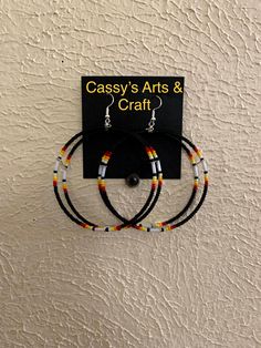 These hoops are doubled layered. They are light weight. Made out of seed beads. If you got any questions just message us. Thanks for looking at our page. We also have some clearance items or raffles on are Facebook group pages. Come check us out at Cassy's Native Selling & Auctions or Cassy's Native Beadwork & Apparels. Adjustable Circular Beaded Earrings With Tiny Beads, Adjustable Hoop Beaded Earrings With Black Beads, Adjustable Hoop Beaded Earrings With Dangling Beads, Adjustable Beaded Hoop Earrings, Adjustable Black Beaded Hoop Jewelry, Adjustable Hoop Beaded Earrings With Colorful Beads, Adjustable Hoop Earrings With Tiny Beads, Hoop Earrings With Tiny Beads, Adjustable Round Black Beaded Earrings