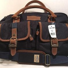 This Is A Navy Blue Fabric With Brown Leather Trim Travel Bag With Detachable Padded Shoulder Strap By Field & Stream! Condition: Brand New With Tags. Please Note: *There Is A Small Area Of Lightening To The Fabric On The Bottom From Apparent Shelf Wear, Really Not Significant.* Features: Dimensions: 16"L, 12"H, 4"W Hand Carry Leather Straps And Additional Detachable Padded Fabric Shoulder Strap Padded Removable Pouch, Good For Protecting Smaller Electronic Devices D500/12 Large Luggage, Pad Bag, Navy Blue Fabric, Trim Color, Blue Fabric, Travel Luggage, Luggage Bags, Leather Trims, Travel Bag