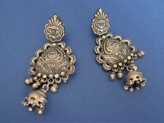 Astounding big silver earrings from Rajastan. Tribal earrings from Jaisalmer area, 92.5 silver masterfully carved. Notice! Earlobe piercings should be wide for these earrings. Length: 7.8 centimeters Weight. 22 grams each We keep the original patina of our vintage silver jewelry pieces, but it can be cleaned on request.  Shipping: Certified Post Office Mail with track number Thanks for your visit! Traditional Sterling Silver Engraved Earrings, Traditional Engraved Sterling Silver Earrings, Ornate Oxidized Earrings For Festive Occasions, Ornate Oxidized Finish Earrings For Festive Occasions, Ornate Oxidized Finish Festive Earrings, Ornate Heavy Sterling Silver Jewelry, Silver Filigree Chandbali Earrings, Festive Silver Earrings With Intricate Design, Silver Chandbali Earrings With Filigree