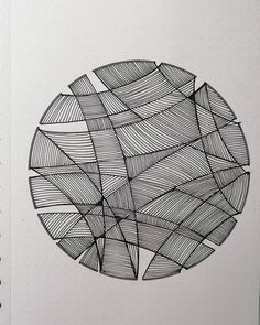 a spiral notebook with an abstract drawing on it