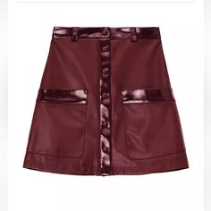 Crafted Of Faux Leather, Staud's Paper Miniskirt Is Elevated By Complementary Metallic Trim. Banded Waist Belt Loops Snap Front Front Patch Pockets 100% Polyurethane Dry Clean Imported Size & Fit About 16.75" Long Line Drawn Through The Name To Prevent Store Returns. Item Was Purchased As In Store Final Sale Merchandise. If You Need Additional Information Or Pictures Please Ask Prior To Making A Purchase. Free People Sweater Outfit, Paper Skirt, Camel Outfit, Leather Miniskirt, Vegan Leather Skirt, Red Mini Skirt, White Booties, Faux Leather Pants, Leather Mini Skirts