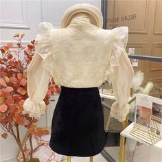 Long sleeve chiffon blouse with a tie up neckline and ruffle shoulder and cuff details. Blouses Women, Lace Tie, Flare Sleeves, Tie Neck Blouse, Cuff Detail, Chiffon Long Sleeve, Chiffon Blouse, Shirt Women, Flared Sleeves