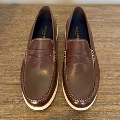 Brand New Cole Haan Grand Leather Loafer, Size 11.5. Only Worn Once. Casual Wingtip Slip-ons With Brogue Detailing, Classic Brown Low-top Slip-ons, Casual Wingtip Loafers With Leather Sole, Classic Brown Low-top Loafers, Casual Wingtip Slip-ons With Leather Footbed, Casual Brogue Moccasins For Business Casual, Casual Brown Wingtip Slip-ons, Casual Moccasins With Brogue Detailing For Business Casual, Brown Slip-on Boat Shoes For Work