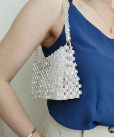 Beaded Bag in Clear Crystal bag, beaded handbag, sparkling bag, party bag, glitter bag, handmade bag, fancy bag, designer bag, evening purse Crystal beaded bags are popular choices for formal occasions, evening events, or any time when a touch of glamour is desired. They can add a statement-making element to an outfit and are often chosen to complement elegant dresses or evening gowns. The beaded texture of the bag not only adds visual interest but also provides a tactile and luxurious feel. Whe Sequined Rectangular Bag For Events, Rectangular Sequined Bag For Events, Rectangular Sequin Bag For Events, Rectangular Sequined Shoulder Bag For Party, Rectangular Sequined Party Shoulder Bag, Rectangular Sequin Event Bag, Glamorous Rectangular Sequin Shoulder Bag, Beaded Shoulder Bag For Party, Handheld Beaded Shoulder Bag For Party