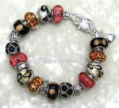 European Style Charm Bracelet "One of a Kind" Brown, Black & White Glass Beads Black Crystal European Charms Silver European Charm Beads Available In Sizes 8" 8 1/2" 9" each size has 1" additional extension chain *  FREE SHIPPING on orders of $35 or more *  Thank You For Stopping By My Shop           www.muranomoon.com Black Bohemian Bracelets With Large Beads, Black Bohemian Crystal Bracelet With Round Beads, Bohemian Black Crystal Bracelet With Round Beads, Black Crystal Bracelet With Spacer Beads For Gift, Gift Black Crystal Bracelet With Spacer Beads, Black Bracelets With Large Beads For Gift, Black Beaded Bracelets With Heart Beads As Gift, Black Bracelets With Large Beads As Gift, Black Beaded Bracelets With Heart Beads For Gifts