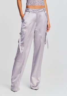 The André Pant is a glamorous twist to the on-trend cargo pant. Our version features the utilitarian details—side pockets and a wide leg—reimagined in a silky fabrication, perfect for going out. Shown here in Mink Grey. 76% Acetate, 24% Polyester Made in China Model is 5'10" wearing size S Style No. SS23-6539 Chic Wide Leg Cargo Pants With Flap Pockets, Chic High-waisted Cargo Pants With Flap Pockets, Chic High-waisted Parachute Pants With Cargo Pockets, Chic Straight Cargo Parachute Pants, Chic Straight Cargo Pants With Pockets, Chic Cargo Style Straight Parachute Pants, Chic Cargo Pants With Cargo Pockets, Chic Straight Parachute Pants With Cargo Pockets, Chic Wide-leg Parachute Pants With Cargo Pockets