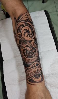 a person with a tattoo on their arm