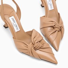 Biscuit-coloured leather slingback from Jimmy Choo featuring a pointed design, a knot on the front, a curved heel and a leather sole.Heel 8,5 cm100% Leather / Leather sole Slingback Shoes, Milky White, Colored Leather, Slingback Pump, Sneaker Heels, Emilio Pucci, Leather Jewelry, Lanvin, Mens Shoes Sneakers