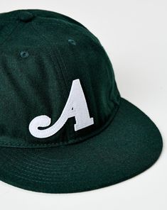 The Awake NY Classic Baseball Cap delivers essential street style with its premium cotton construction and chic leather strap. Embroidered logos add a touch of sophistication, making this cap a versatile accessory for any wardrobe. Embroidered branding Adjustable leather strap Six-panel style 100% Cotton Color: Green Style #: AWK-FW24-HT203GRN Classic Snapback Fitted Hat With Logo Patch, Classic Snapback Hat With Logo Patch, Classic Fitted Hat With Curved Bill For Baseball Season, Classic Curved Bill Fitted Hat For Baseball Season, Classic Sports Dad Hat, Classic Cotton Baseball Cap With Logo Detail, Sporty Six-panel Fitted Hat With Embroidered Logo, Sporty Fitted Six-panel Hat With Embroidered Logo, Casual Baseball Cap With Logo Detail