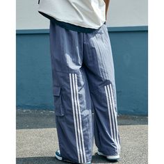 Striped Panel Sports Wide-Leg Pants Material: 45% Nylon + 55% Polyester Size: S, M, L, XL Color: Black, Yellow, Blue Applicable Scene: Leisure, Daily, Vacation Urban Blue Pants With Pockets, Baggy Wide-leg Jogging Pants, Baggy Wide-leg Pants For Jogging, Blue Stretch Pants With Cargo Pockets, Baggy Wide Leg Bottoms For Jogging, Stretch Blue Pants With Cargo Pockets, Baggy Blue Urban Cargo Pants, Baggy Functional Bottoms, Full Length Cargo Pants For Sports