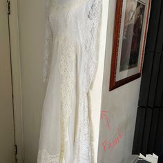 A Homemade Wedding Dress. Size 6-8. Lace Fabric. Ivory Color, Never Worn. In A Great Condition Cream Vintage Dress For Wedding, Cream Floor-length Vintage Dress For Wedding, White Wedding Dress With Lace Trim For Formal Occasion, Formal White Wedding Dress With Lace Trim, Cream Vintage Floor-length Wedding Dress, Cream Floor-length Vintage Wedding Dress, White Ball Gown With Lace Trim, Off-white Wedding Dress With Lace Trim, Off White Wedding Dress With Lace Trim