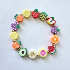 Spice up the summer with this full fruit beaded bracelet. Separated by 14k gold filled beads. They will NOT tarnish Adjustable Beaded Bracelets With Fruit Design As Gift, Fruit Bead Bracelet, Bracelet Fruits, Orange Fruit Bracelet, Beads Fruit, Fruit Bracelet, Bracelet Summer, Bracelets Ideas, Fruit Jewelry