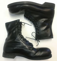 Vintage Black Winter Boots, Black Work Boots With Rubber Heel Cap, Vintage Black Work Boots With Round Toe, Vintage Black Workwear Boots, Military Black Boots With Reinforced Toe, Military Boots With Reinforced Toe In Black, Black Military Combat Boots With Round Toe, Classic Black Combat Boots For Outdoor, Black Leather Military Boots