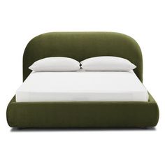 a green bed with white pillows and two pillow on the headboard, in front of a white background