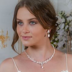 "Very romantic crystal bridal jewelry set: necklace, bracelet and earrings. Gorgeous bridal or bridesmaids jewelry set for your wedding day!   This wedding jewelry set is available in silver, gold or pink gold(rose gold) color to match your dress.   Necklace measures about 18\" long. Earrings measure about 1 1/4\" long and 1/4\" wide. Matching regular bracelet is measuring: 7\" long and 1/4\" wide or adjustable bracelet option is available as well to fit a larger wrist. Please, note that bracele Elegant White Jewelry Sets For Brides, White Cubic Zirconia Bridal Necklace With Matching Earrings, Wedding Crystal Jewelry Sets With Pearl Drop, Wedding Crystal Pearl Drop Jewelry Sets, Elegant Crystal Bridal Necklace, Crystal Pearl Drop Jewelry Sets For Wedding, Delicate Cubic Zirconia Jewelry For Mother Of The Bride, White Crystal Bridal Necklace With Matching Earrings, Bridal Necklace With Pearl Drop For Wedding