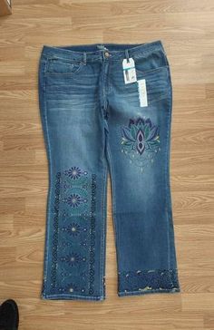 New Mid Rise Med Wash Size 24 Slim Fit Stretch Bootcut Womens Jeans. Embelished with Hand Painted Mandala Symbols used in Budism to Meditate Western Painted Jeans, Blue Hand Painted Cotton Jeans, Mid-rise Fitted Embroidered Flare Jeans, Fitted Mid-rise Jeans With Rhinestones, Bohemian Mid-rise Cotton Flare Jeans, Mandala Symbols, Painted Jeans, Bootcut Jeans, Tags