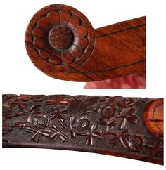 an ornate carved wooden handle with flowers on it