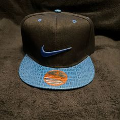 Nike Snapback One Size Fits All Black Hat With Blue Snakeskin Nwt Ships Fast Casual Nike Flat Brim Hat, Casual Nike Adjustable Snapback Hat, Nike Adjustable Flat Bill Baseball Cap, Blue Sports Hat With Short Brim, Nike Adjustable Snapback Hat With Flat Bill, Nike Adjustable Flat Bill Snapback Hat, Blue Flat Brim Hat For Streetwear, Nike Casual Adjustable Snapback Hat, Blue Short Brim Sports Hat