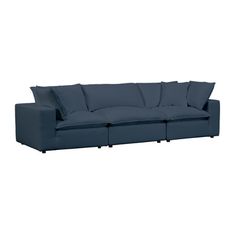 a blue couch with four pillows on the back and one arm folded open to show it's side